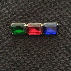 Colored stone brooch